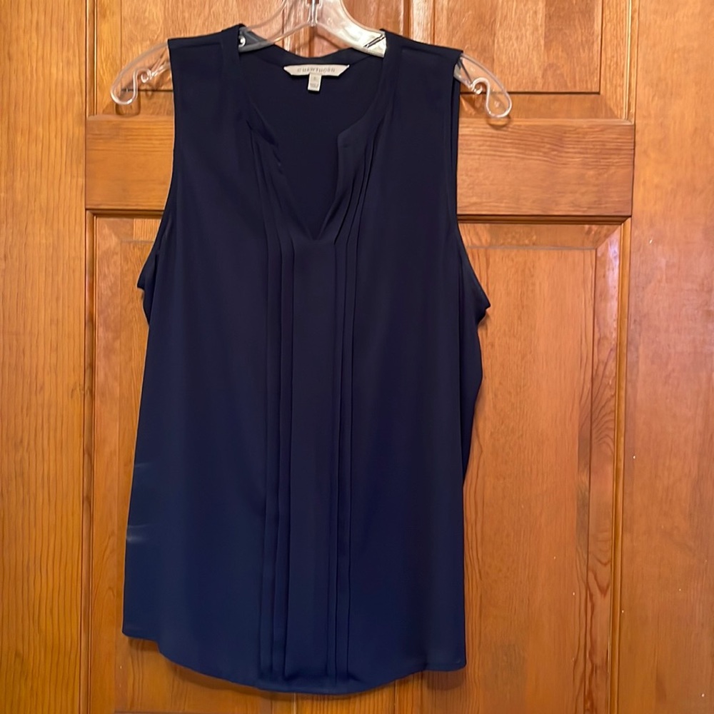 Beautiful sleeveless blouse. Navy with pleat details